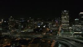 5.7K aerial stock footage stationary view of downtown buildings and skyscraper at night, Downtown Milwaukee, Wisconsin Aerial Stock Footage | DX0002_151_026