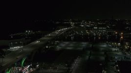 5.7K aerial stock footage of light traffic on Interstate 794 at night, Downtown Milwaukee, Wisconsin Aerial Stock Footage | DX0002_151_029