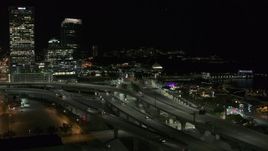 5.7K aerial stock footage of light traffic on I-794 freeway interchange at night, Downtown Milwaukee, Wisconsin Aerial Stock Footage | DX0002_151_034