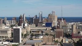 5.7K aerial stock footage ascend for a wide view of the city's skyline in Downtown Milwaukee, Wisconsin Aerial Stock Footage | DX0002_152_002