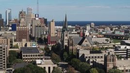 5.7K aerial stock footage of flying by the Church of the Gesu in Downtown Milwaukee, Wisconsin Aerial Stock Footage | DX0002_152_012