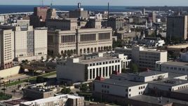 5.7K aerial stock footage of flying away from a courthouse in Milwaukee, Wisconsin Aerial Stock Footage | DX0002_152_019