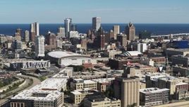 5.7K aerial stock footage of the city's skyline and arena in Downtown Milwaukee, Wisconsin, seen from I-43 Aerial Stock Footage | DX0002_152_022