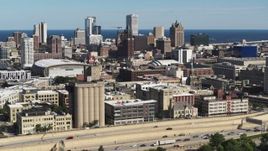 5.7K aerial stock footage the city's skyline seen from the freeway in Downtown Milwaukee, Wisconsin Aerial Stock Footage | DX0002_152_028