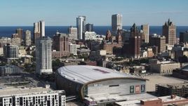 5.7K aerial stock footage the city's skyline while ascending by arena in Downtown Milwaukee, Wisconsin Aerial Stock Footage | DX0002_152_031