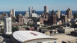 5.7K aerial stock footage approach the city's skyline and arena in Downtown Milwaukee, Wisconsin Aerial Stock Footage | DX0002_152_033