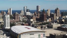 5.7K aerial stock footage fly toward the city's skyline from the arena in Downtown Milwaukee, Wisconsin Aerial Stock Footage | DX0002_152_036