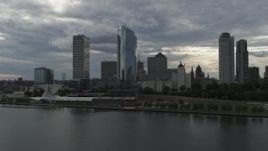 5.7K aerial stock footage of approaching skyscrapers and the art museum from Lake Michigan in Downtown Milwaukee, Wisconsin Aerial Stock Footage | DX0002_154_004