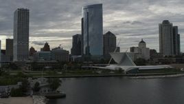 5.7K aerial stock footage of skyscrapers and the art museum by Lake Michigan in Downtown Milwaukee, Wisconsin Aerial Stock Footage | DX0002_154_007