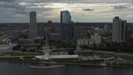 5.7K aerial stock footage flyby and away from skyscrapers and the art museum by Lake Michigan in Downtown Milwaukee, Wisconsin Aerial Stock Footage | DX0002_154_009