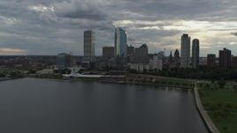 5.7K aerial stock footage reverse view of city skyline and the art museum by Lake Michigan in Downtown Milwaukee, Wisconsin Aerial Stock Footage | DX0002_154_011