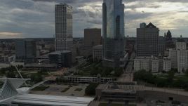 5.7K aerial stock footage of flying by tall skyscrapers in Downtown Milwaukee, Wisconsin Aerial Stock Footage | DX0002_154_019