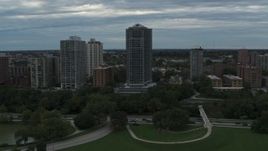 5.7K aerial stock footage of flying by a condominium high-rise in Milwaukee, Wisconsin Aerial Stock Footage | DX0002_154_028