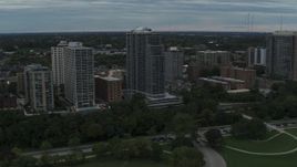 5.7K aerial stock footage of passing by a condominium high-rise in Milwaukee, Wisconsin Aerial Stock Footage | DX0002_154_029
