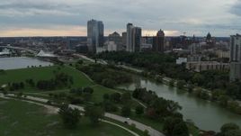 5.7K aerial stock footage of flying by the skyline, seen from Veterans Park, Downtown Milwaukee, Wisconsin Aerial Stock Footage | DX0002_154_032