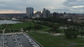 5.7K aerial stock footage stationary view of the city's skyline, seen from Veterans Park, Downtown Milwaukee, Wisconsin Aerial Stock Footage | DX0002_154_035