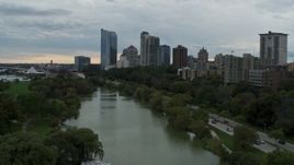 5.7K aerial stock footage fly over pond at Veterans Park, approach skyline of Downtown Milwaukee, Wisconsin Aerial Stock Footage | DX0002_154_037