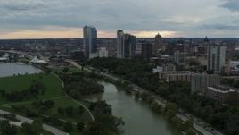 5.7K aerial stock footage of the city's skyline, seen seen while passing Veterans Park, Downtown Milwaukee, Wisconsin Aerial Stock Footage | DX0002_154_040