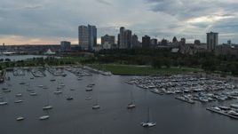 5.7K aerial stock footage of Veterans Park and skyline of Downtown Milwaukee, Wisconsin while descending by marina Aerial Stock Footage | DX0002_154_043