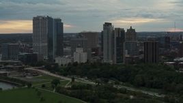 5.7K aerial stock footage of towering skyscrapers in the city's skyline at sunset, Downtown Milwaukee, Wisconsin Aerial Stock Footage | DX0002_155_002