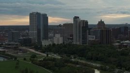 5.7K aerial stock footage approach the city's skyline at sunset, Downtown Milwaukee, Wisconsin Aerial Stock Footage | DX0002_155_003