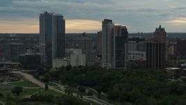 5.7K aerial stock footage slowly flying away from the city's skyline at sunset, Downtown Milwaukee, Wisconsin Aerial Stock Footage | DX0002_155_006