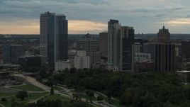 5.7K aerial stock footage flying past the city's skyline at sunset, Downtown Milwaukee, Wisconsin Aerial Stock Footage | DX0002_155_007