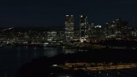 5.7K aerial stock footage fly over marina with a view of the city's skyline at night, Downtown Milwaukee, Wisconsin Aerial Stock Footage | DX0002_155_042