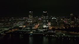 5.7K aerial stock footage of towering skyscrapers near the shoreline at night, Downtown Milwaukee, Wisconsin Aerial Stock Footage | DX0002_157_007