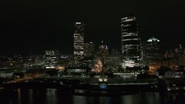 5.7K aerial stock footage approach and flyby towering skyscrapers at night, Downtown Milwaukee, Wisconsin Aerial Stock Footage | DX0002_157_008
