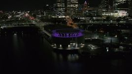 5.7K aerial stock footage orbiting Discovery World museum at night, Downtown Milwaukee, Wisconsin Aerial Stock Footage | DX0002_157_009