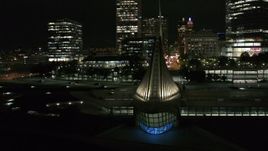 5.7K aerial stock footage approach and orbit the lakefront museum at night, Downtown Milwaukee, Wisconsin Aerial Stock Footage | DX0002_157_017