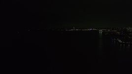 5.7K aerial stock footage of a view of the shore of Lake Michigan at night, Milwaukee, Wisconsin Aerial Stock Footage | DX0002_157_021