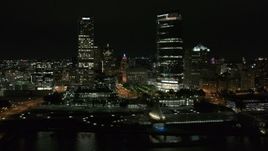 5.7K aerial stock footage stationary view of the lakefront museum and skyscrapers at night, Downtown Milwaukee, Wisconsin Aerial Stock Footage | DX0002_157_024
