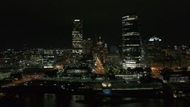 5.7K aerial stock footage of two skyscrapers and lakefront museum at night, Downtown Milwaukee, Wisconsin Aerial Stock Footage | DX0002_157_026