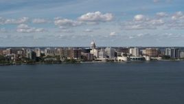 5.7K aerial stock footage slowly flying by lakefront city buildings in Madison, Wisconsin Aerial Stock Footage | DX0002_158_006