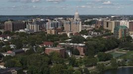 5.7K aerial stock footage approach apartment buildings and capitol dome in Madison, Wisconsin Aerial Stock Footage | DX0002_158_011