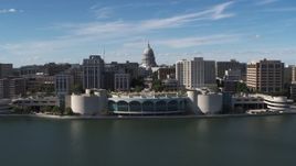 5.7K aerial stock footage reverse view of capitol dome, office buildings, and convention center, Madison, Wisconsin Aerial Stock Footage | DX0002_158_026
