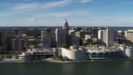 5.7K aerial stock footage flyby the convention center with view of capitol dome, office buildings, Madison, Wisconsin Aerial Stock Footage | DX0002_158_032