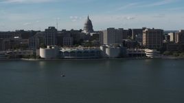 5.7K aerial stock footage flyby convention center with capitol and office buildings in background, Madison, Wisconsin Aerial Stock Footage | DX0002_160_007