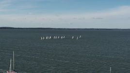 5.7K aerial stock footage of orbiting a group of sailboats on Lake Mendota, Madison, Wisconsin Aerial Stock Footage | DX0002_160_036