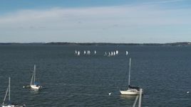 5.7K aerial stock footage an orbit of a group of sailboats on Lake Mendota, Madison, Wisconsin Aerial Stock Footage | DX0002_160_038