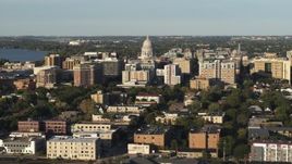5.7K aerial stock footage flying past the capitol dome and downtown buildings, Madison, Wisconsin Aerial Stock Footage | DX0002_161_021