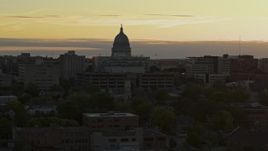 5.7K aerial stock footage ascend toward the capitol dome at sunset, Madison, Wisconsin Aerial Stock Footage | DX0002_161_025