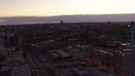 5.7K aerial stock footage approach capitol dome from power plant smoke stacks at twilight, Madison, Wisconsin Aerial Stock Footage | DX0002_162_019