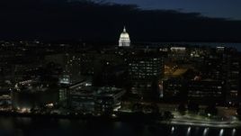 5.7K aerial stock footage ascend away from capitol dome and downtown buildings at twilight, Madison, Wisconsin Aerial Stock Footage | DX0002_162_029