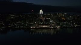 5.7K aerial stock footage a reverse view of the capitol dome and convention center at night, Madison, Wisconsin Aerial Stock Footage | DX0002_162_031