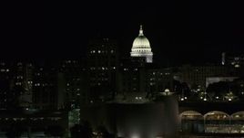 5.7K aerial stock footage flyby State Office Building to reveal capital dome at night, Madison, Wisconsin Aerial Stock Footage | DX0002_162_047