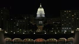 5.7K aerial stock footage focus on the capital at night, descend to reveal convention center, Madison, Wisconsin Aerial Stock Footage | DX0002_162_049
