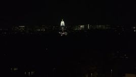 5.7K aerial stock footage of a stationary view of the state capitol dome at night, Madison, Wisconsin Aerial Stock Footage | DX0002_163_013